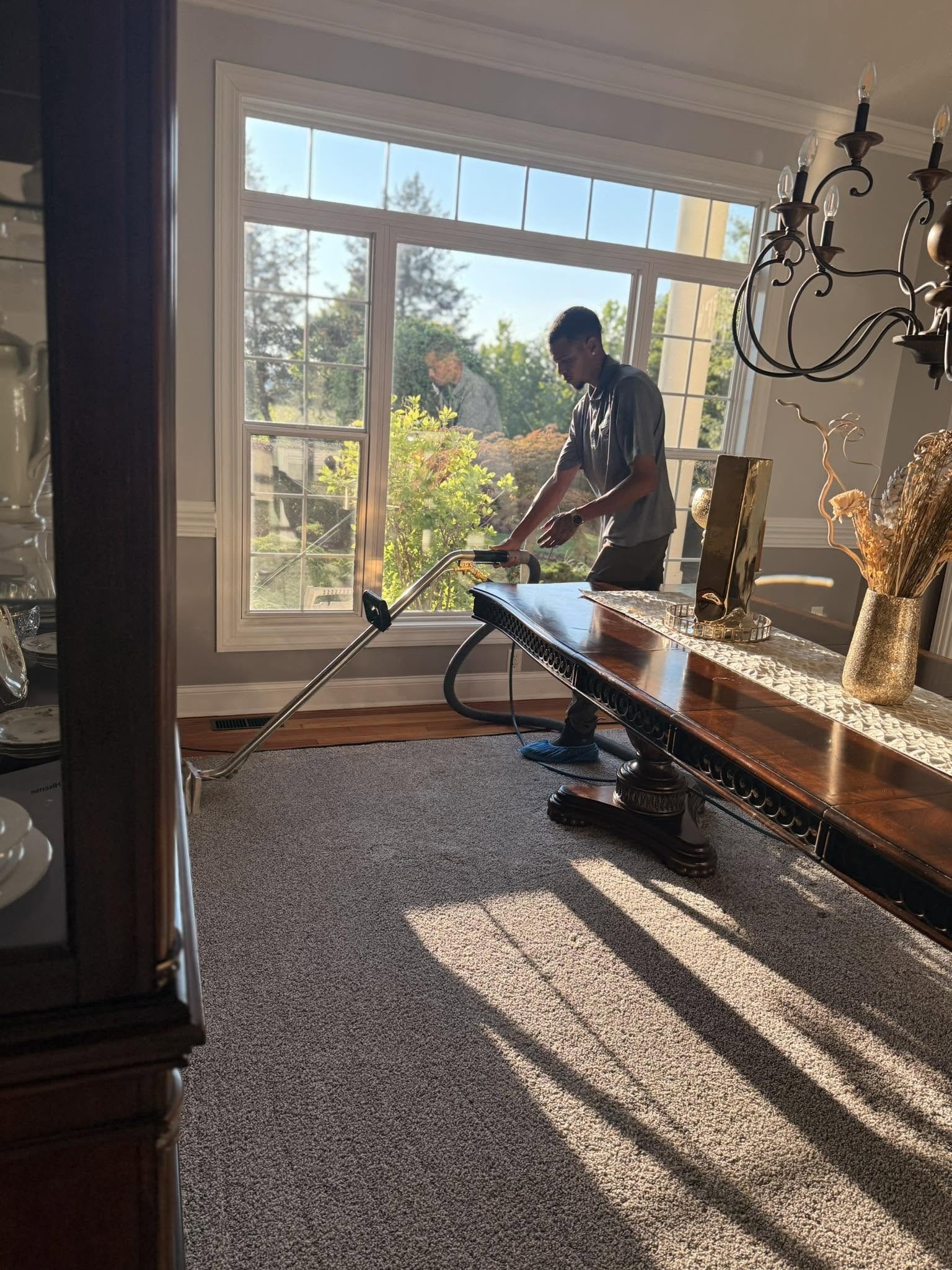 Carpet cleaning in progress